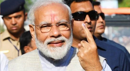 Modi Casting vote at Ranip Booth