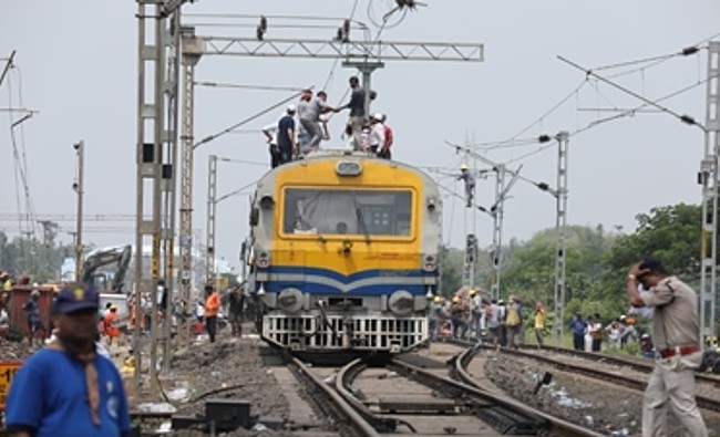 Restoration work continues on war footing at train accident site
