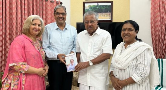 Dr Vishwas Mehta presented his book Ati Jeevanamto Kerala CM Pinarayi Vijayan