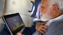 Modi seeing Surya Tilak of Ramlala in Ayodhya on tablet