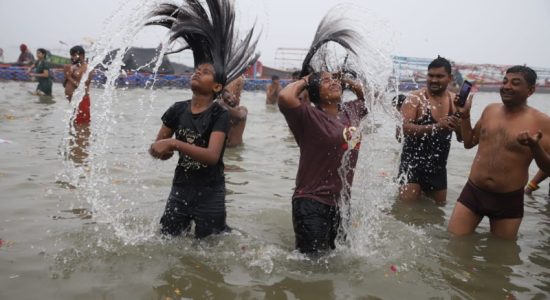 Devotees take holy dip on Paush Purnima