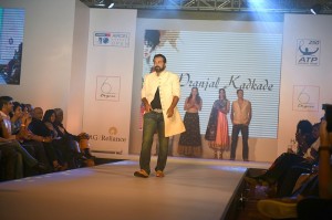 04012017 Bosnia and Herzegovina's tennis player Damir Dzumhur walks the ramp for designers Lalit Dalmia and Pranjal Kadkade during the Aircel Chennai Open fashion show in Chennai on Jan 2, 2017                               